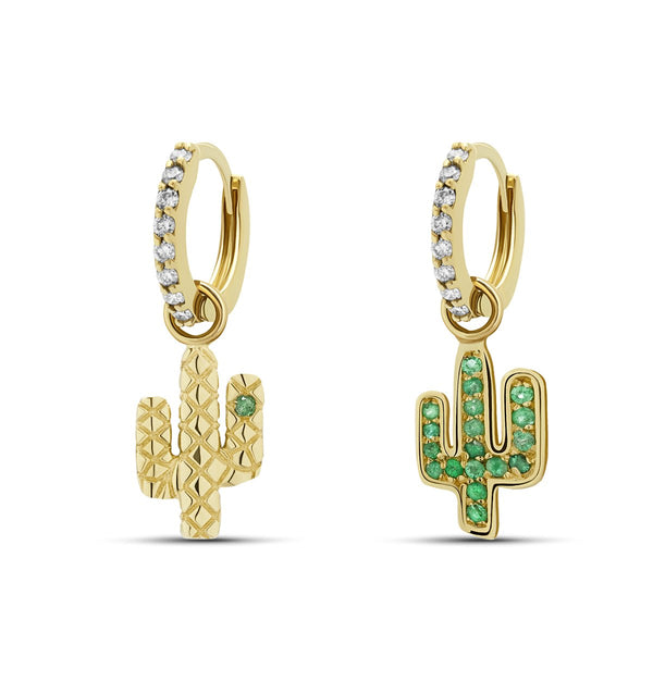 Our 14 karat gold huggie earrings are striking, elegant and have a unique glow! The charm features handset emerald stones whereas the huggies are handset with diamond pave stones.