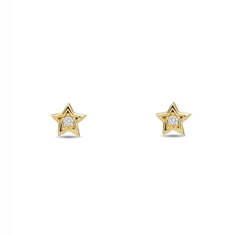 A little piece of the universe. Our 14 karat gold diamond star earring studs are petite and sparkly. 