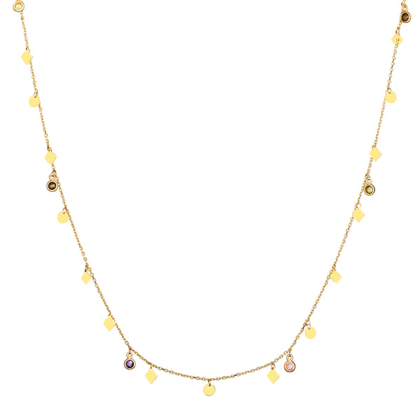 The Nomad Necklace in 14 karat gold is our longest handmade necklace (100cm) and can be worn in many ways. This gold chain with its dazzling charms and stones is the ultimate piece for a layering look. 
