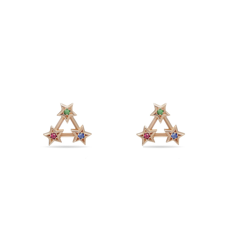 14 karat gold earrings with handset gemstones. Our Rainbow Star Stud Earrings are inspired by warm nights of star gazing. The emerald, sapphire and ruby stones add a playful glow to your eargame.