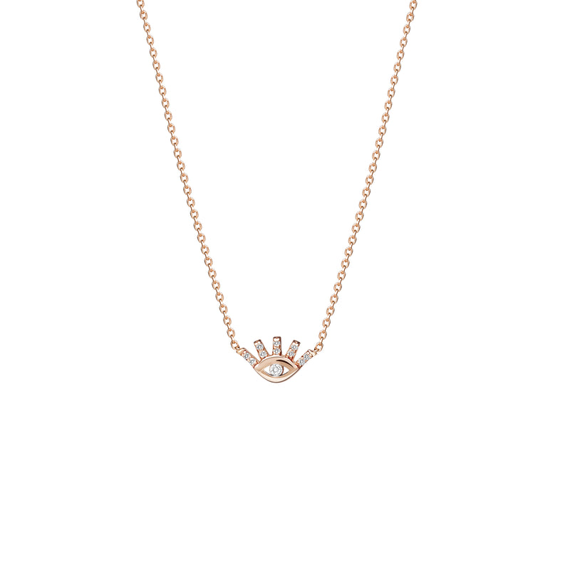 This 14 karat gold eye diamond necklace is our dream jewelry piece. The gold pendant necklace features pave set diamonds on the lashes and a bigger diamond stone in the center of the eye.