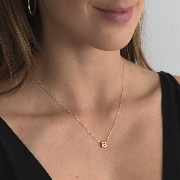 A 18 karat gold vermeil necklace with your initial letter "B". This diamond letter necklace is a special jewelry necklace that can be worn day and night. A genuine diamond stone in the corner of the letter makes this gold diamond necklace a luxury and ideal gift for yourself, your best friend or loved one. 