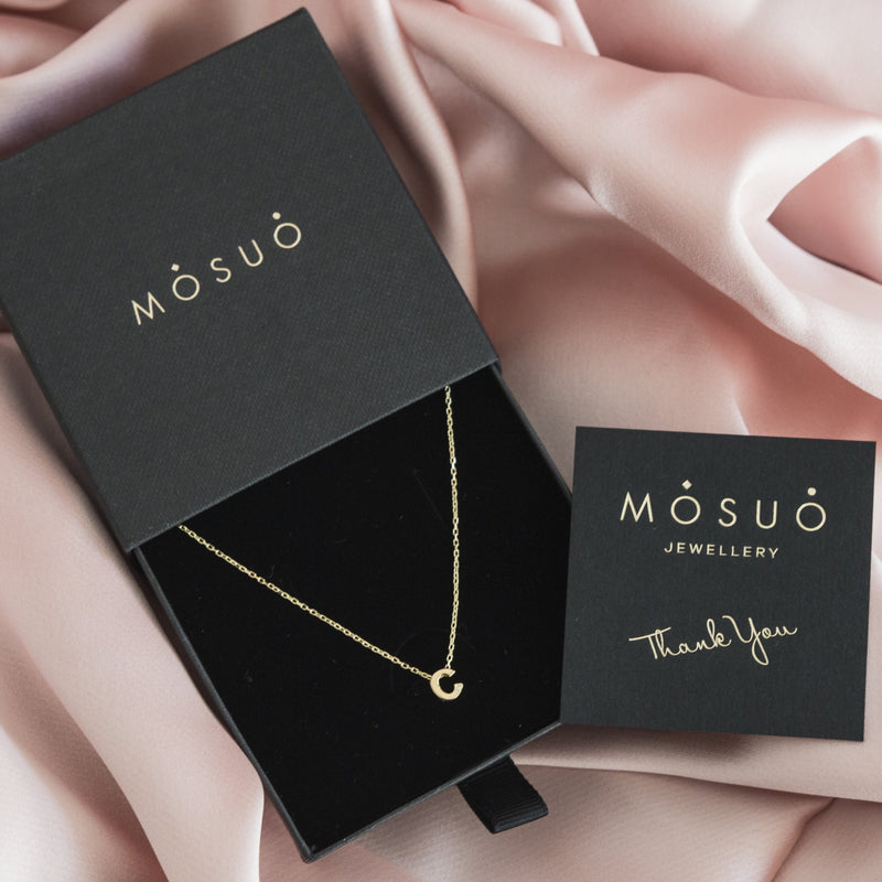 A 18 karat gold vermeil necklace with your initial letter "C". This diamond letter necklace is a special jewelry necklace that can be worn day and night. A genuine diamond stone in the corner of the letter makes this gold diamond necklace a luxury and ideal gift for yourself, your best friend or loved one.
