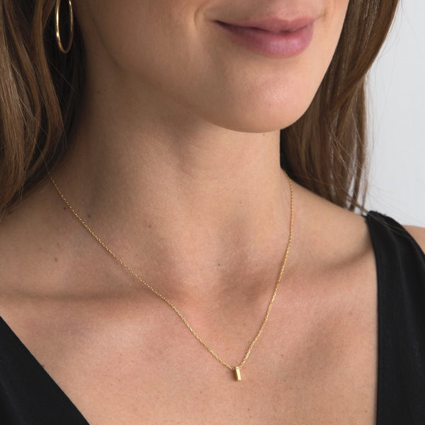 A 18 karat gold vermeil necklace with your initial letter "I". This diamond letter necklace is a special jewelry necklace that can be worn day and night. A genuine diamond stone in the corner of the letter makes this gold diamond necklace a luxury and ideal gift for yourself, your best friend or loved one.